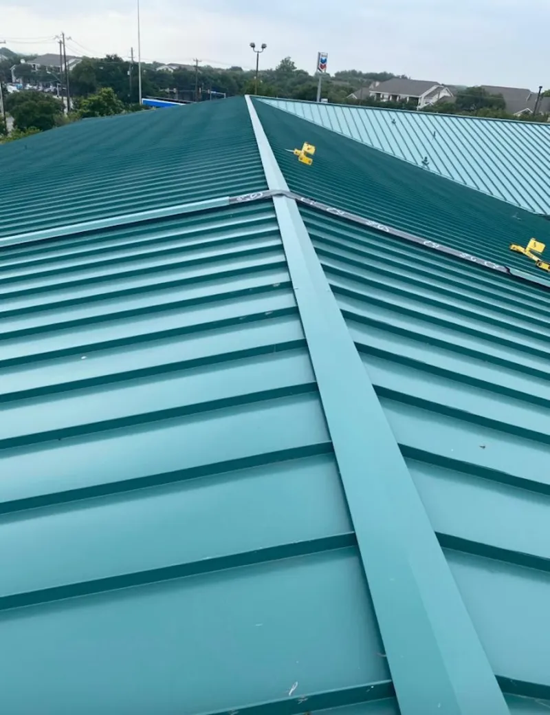 Green commercial metal roof ridge and valley for Metal Roof Repair in Ladue